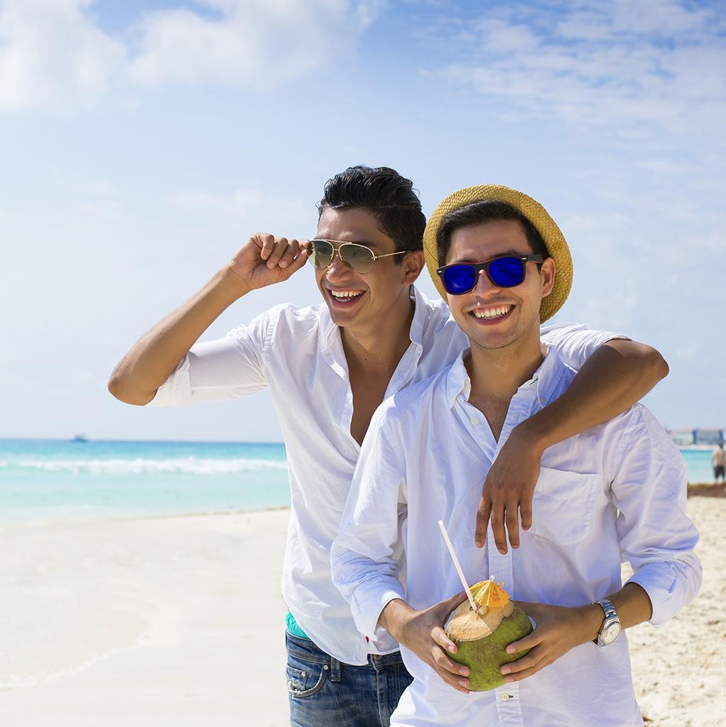 Gay couple at LGBT friendly beach resort