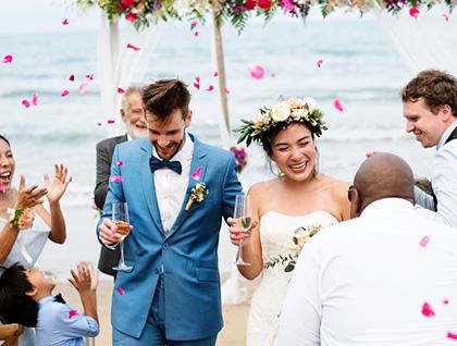 Wedding couple walking down aisle after saying "I do"