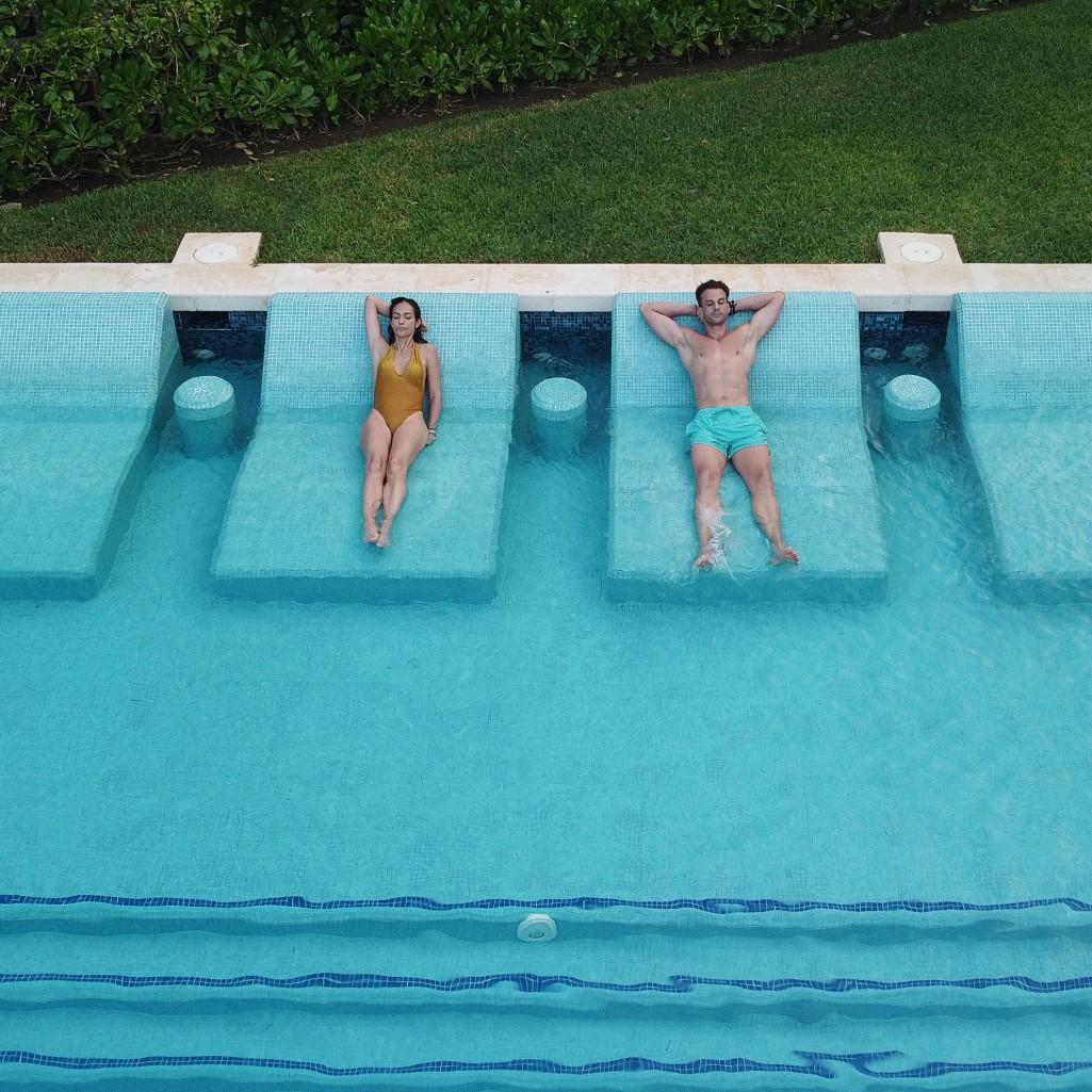 In pool loungers at The Reserve